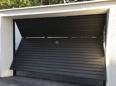 Puertas y Automatismos Enric - Manteniment de Portes de Parking